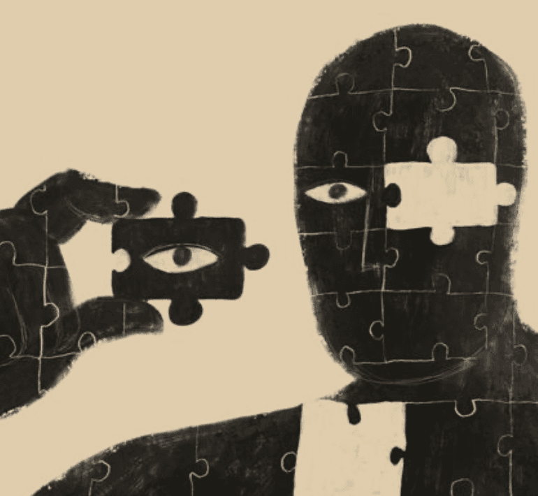 A man playing a drum in front of a group of people