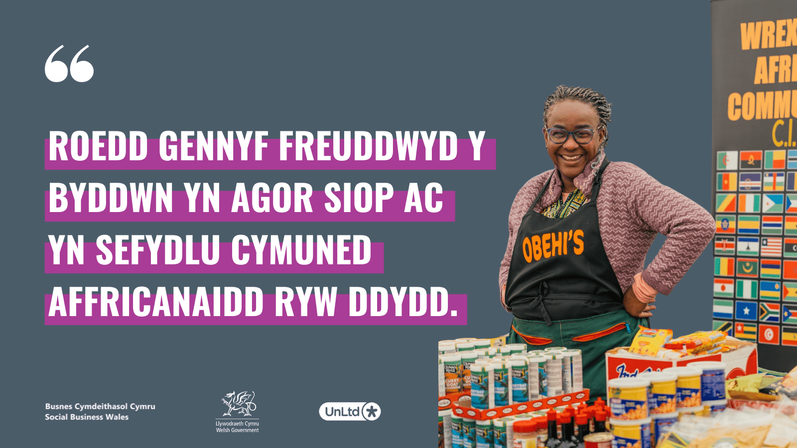 A smiling woman with food supplies and a graphic of a quote in Welsh highlighted in purple.