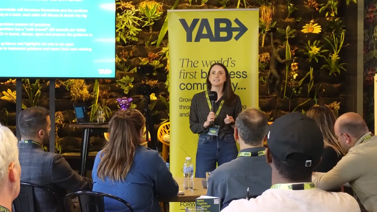 Corporate speaker presenting at a YAB business meeting in Manchester, filmed during a professional corporate event video production by Filmorite Ltd.