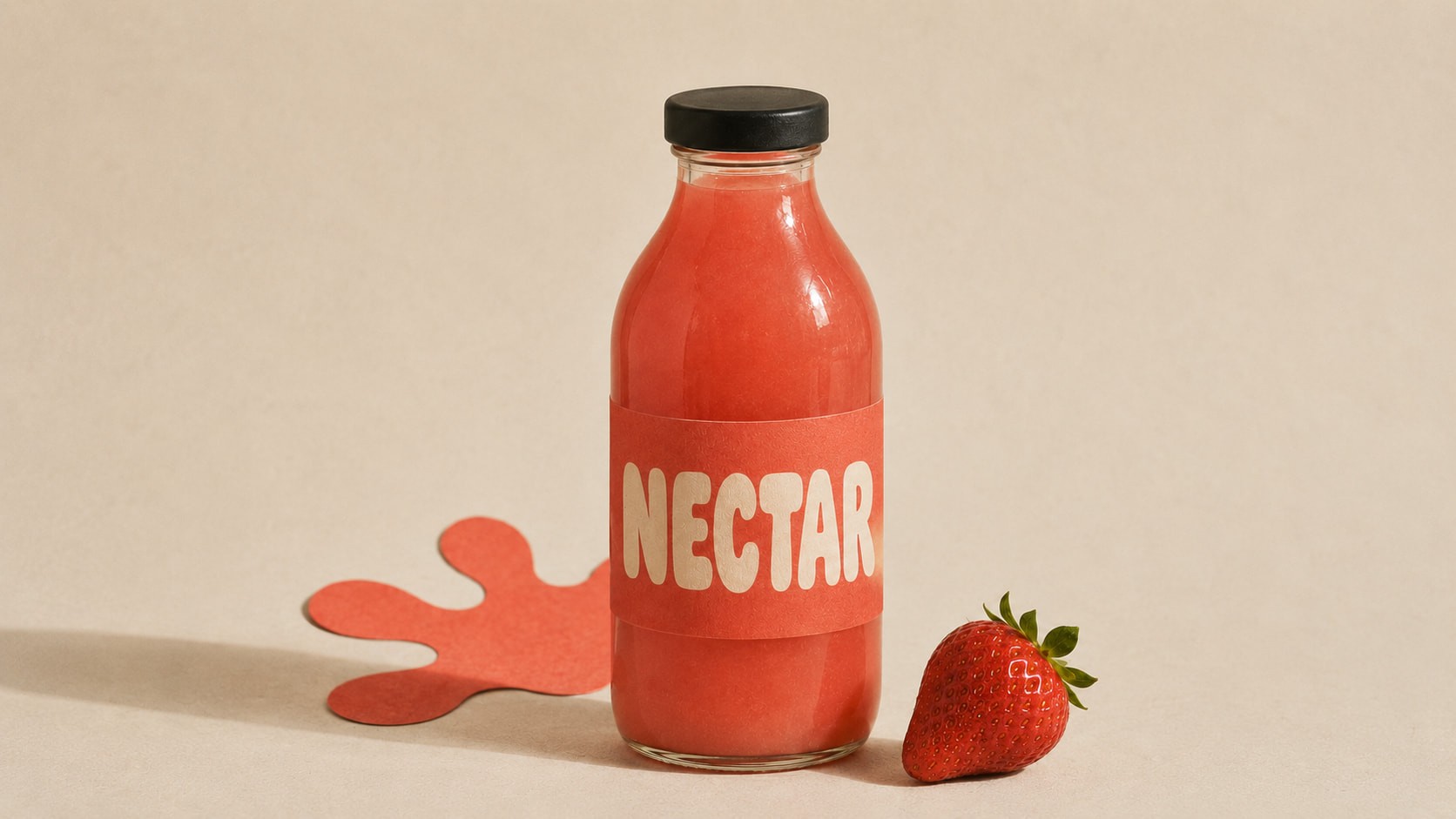 A glass bottle filled with red juice labeled "Nectar" stands on a beige surface. A red, splash-shaped paper and a fresh strawberry are placed beside it.