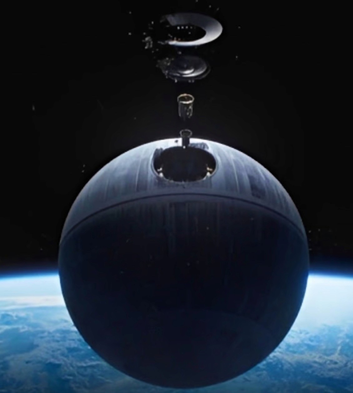 The Death Star being created in space with pieces floating above it