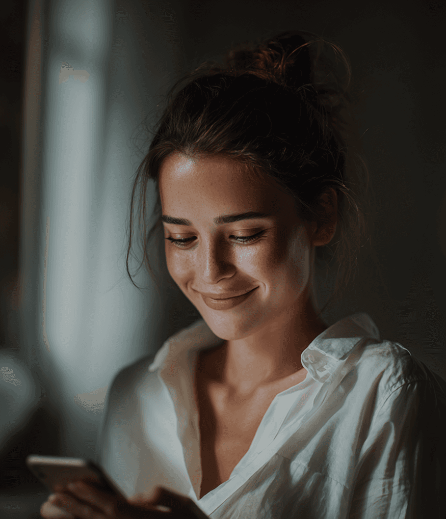 man in train holding smartphone