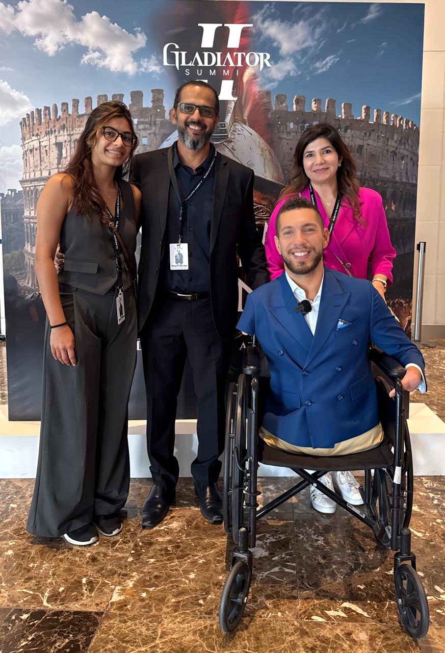 Tanu Chopra with attendees at a business conference
