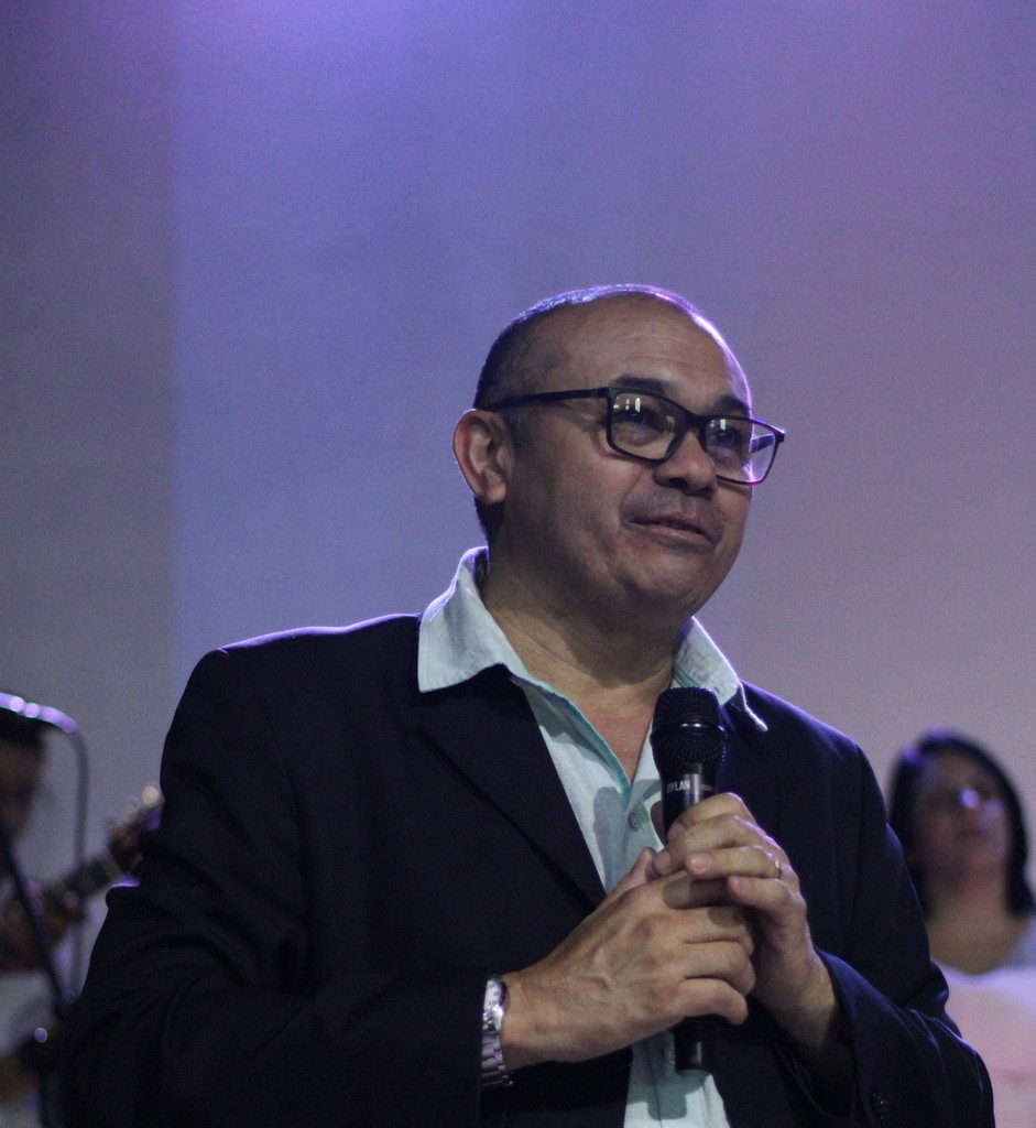 body of water under cloudy sky