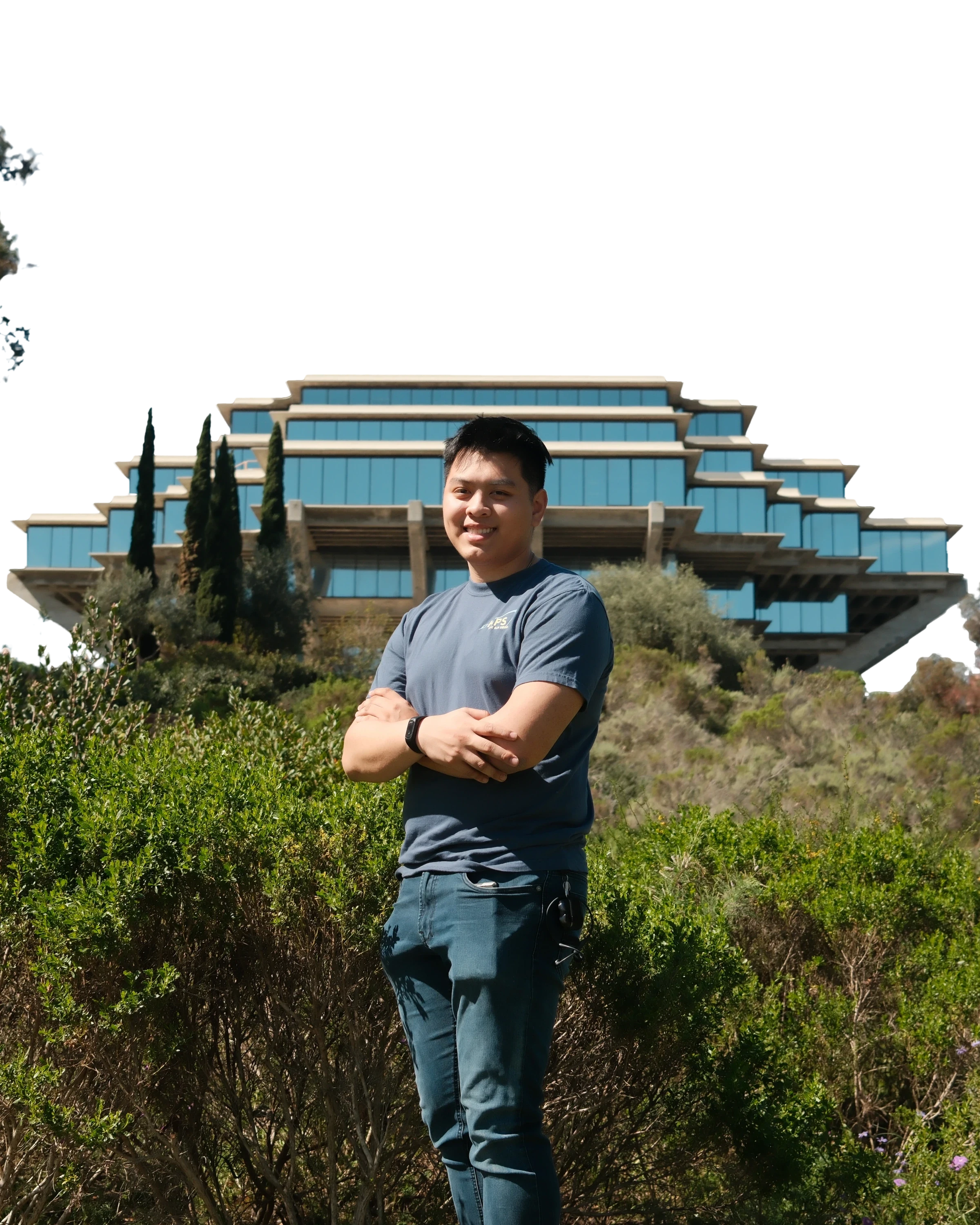 Thienan D. Bui standing in front of Geisel Library at UC San Diego