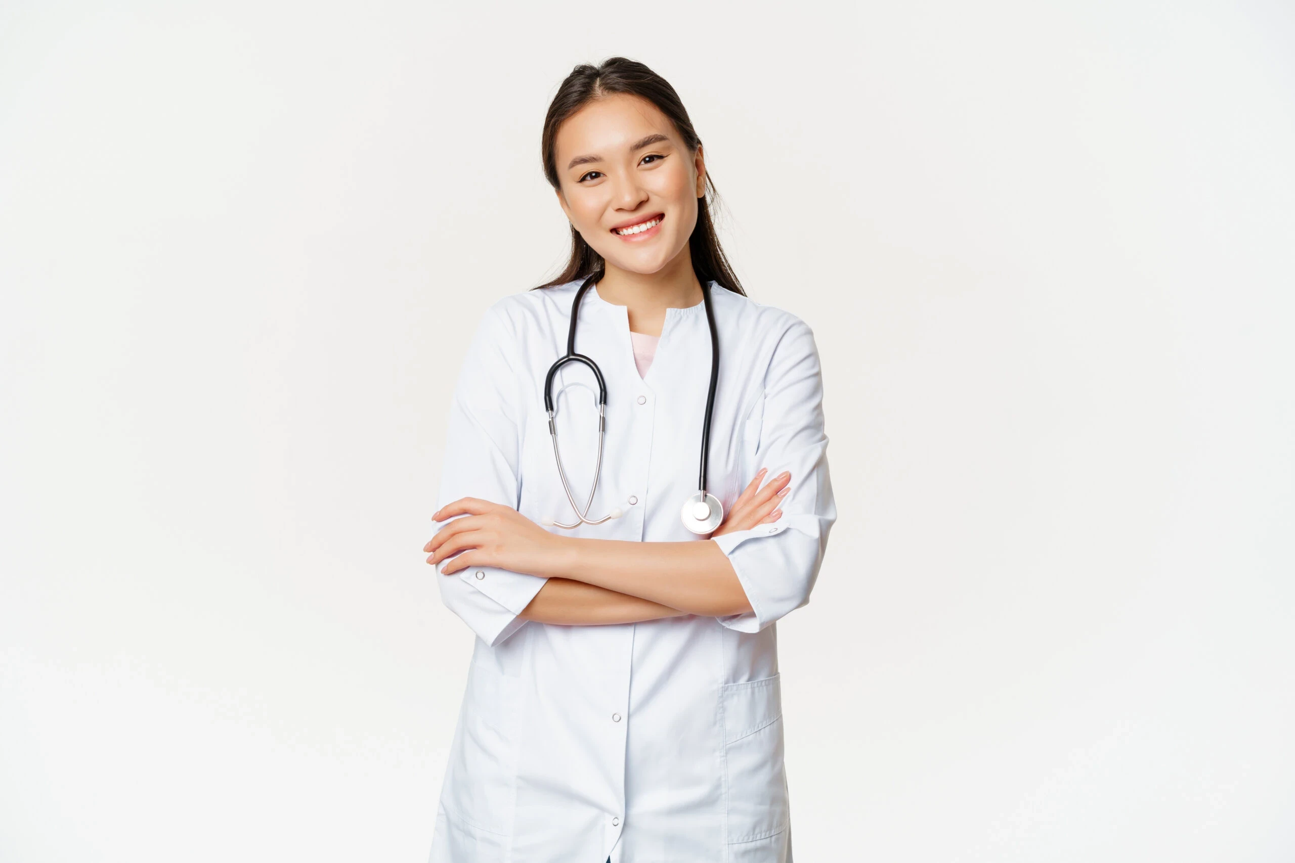 Female physician with her arms folded smiling