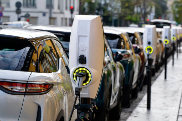 Electric cars charging at a public EV station, representing the EU’s transition to zero-emission vehicles.