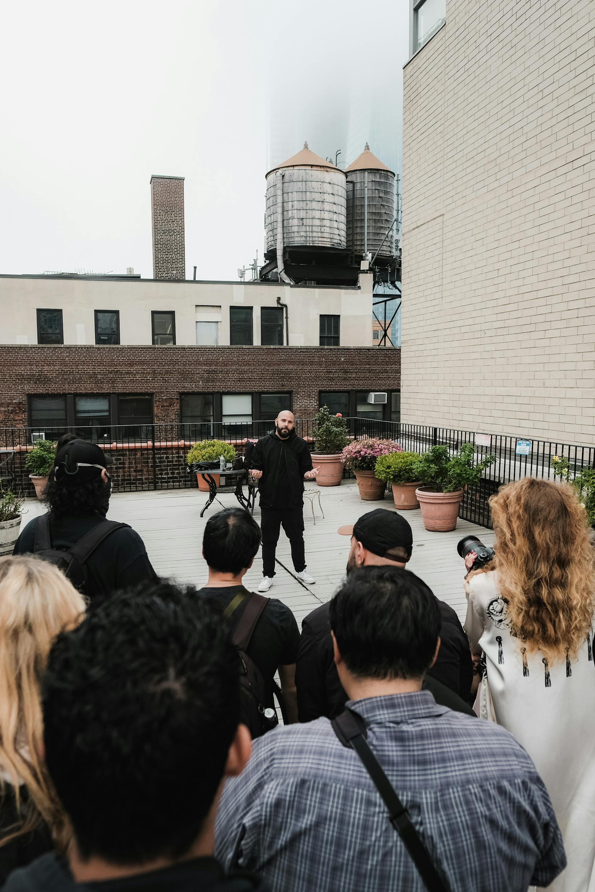 A team gathered on a rooftop