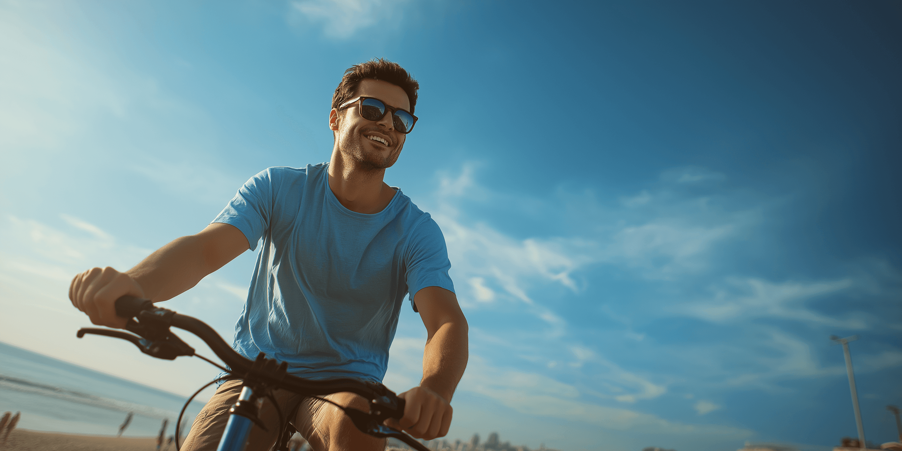 a group of people playing volleyball on a beach