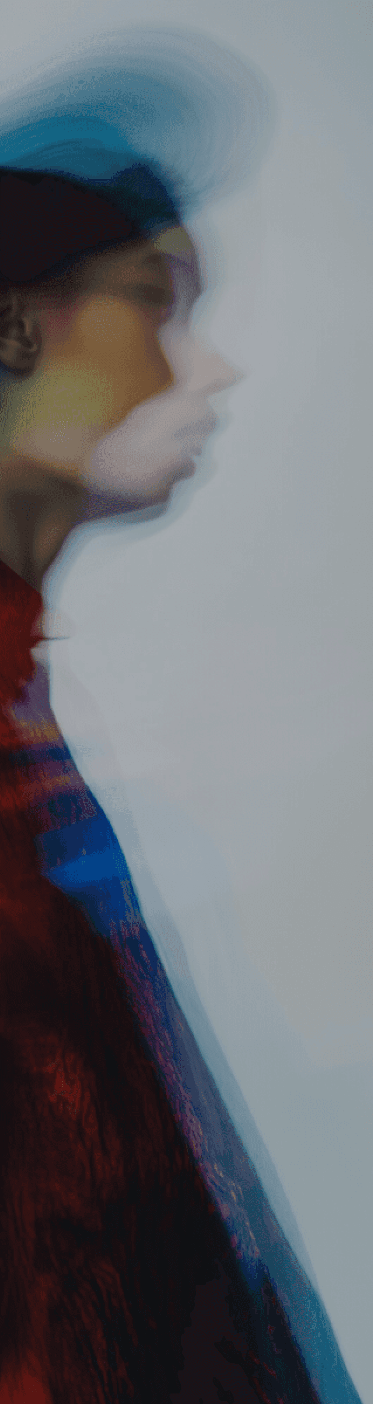 Abstract image with a wave-like form in shades of red and black, with a contrasting white area.