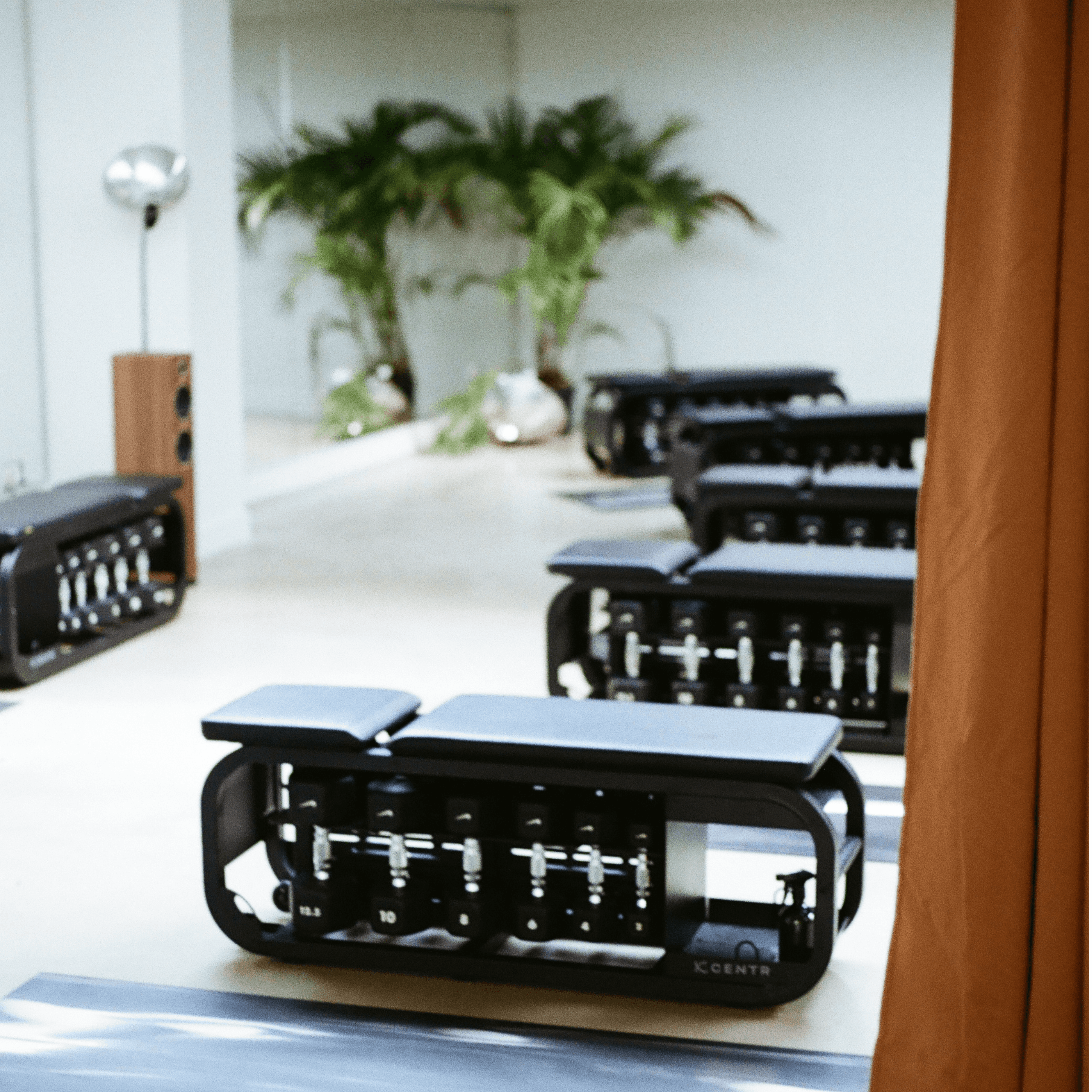 a white couch sitting on top of a white floor