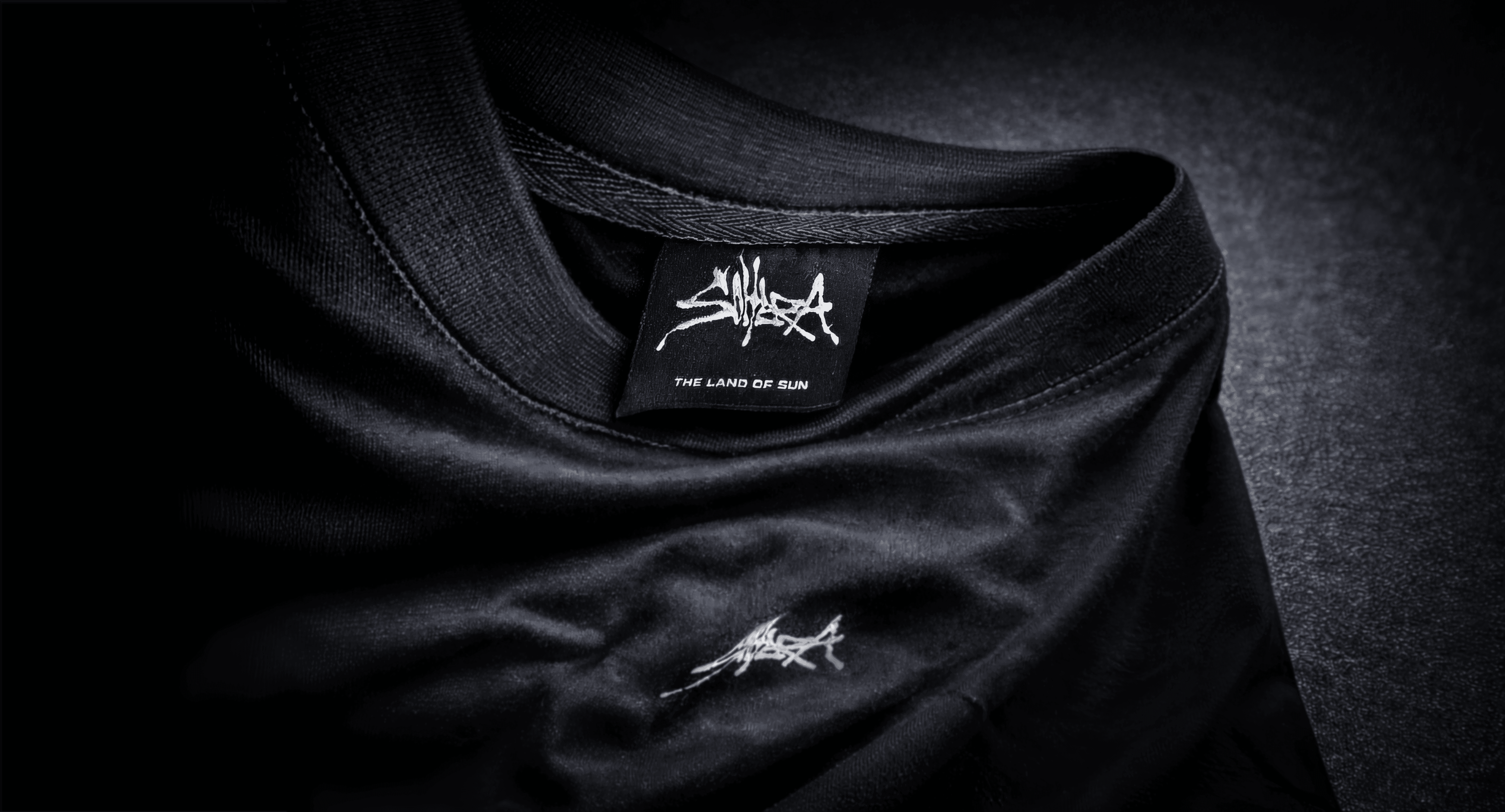 Three stylishly dressed Black men posing together