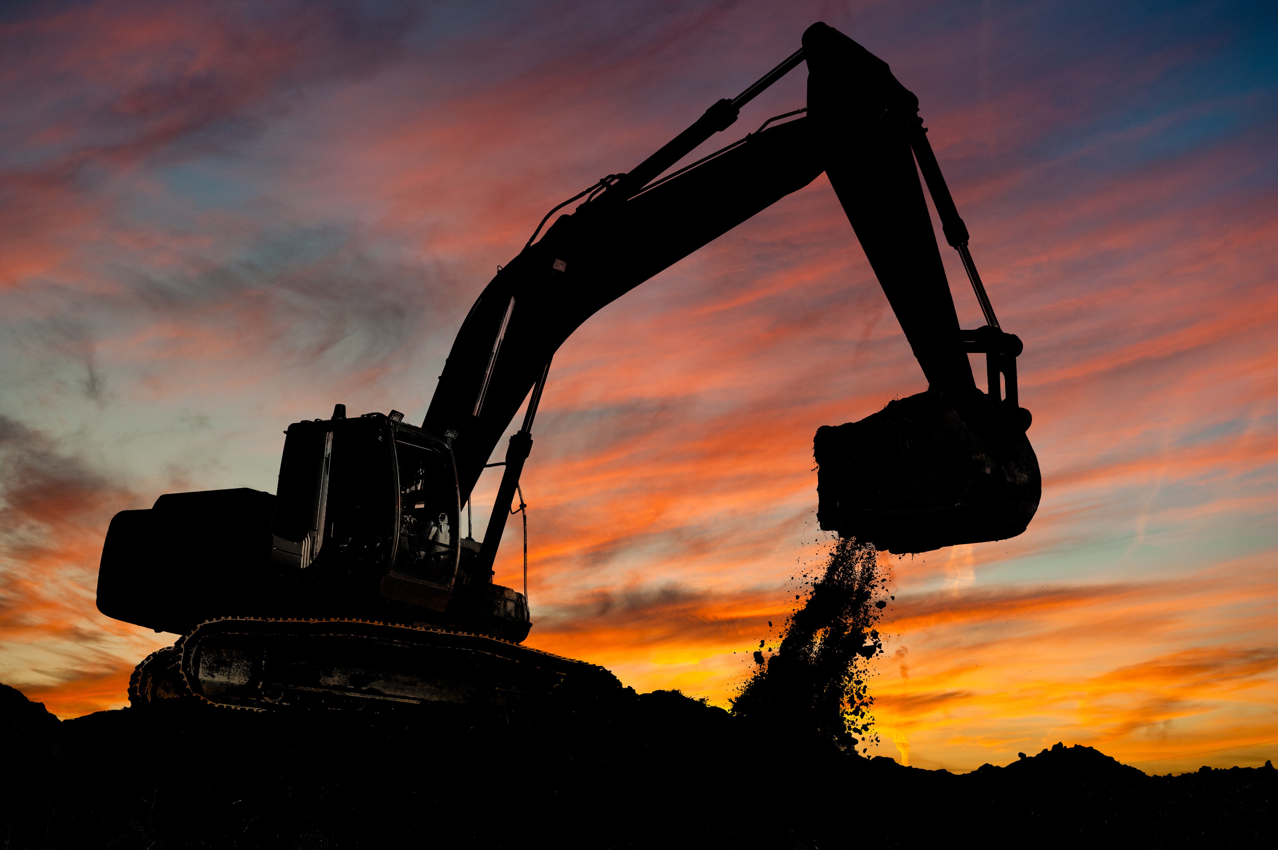 Excavator digging earth