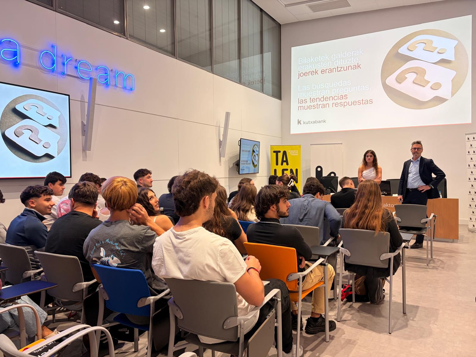 Close-up of a tree stump showing growth rings and a textured brown wood surface.