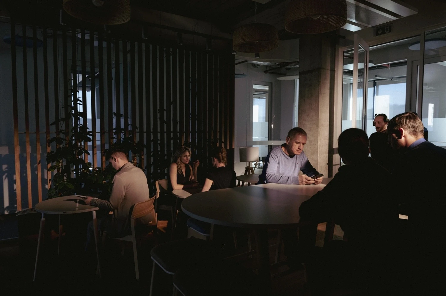 Photo of people sitting in a lobby