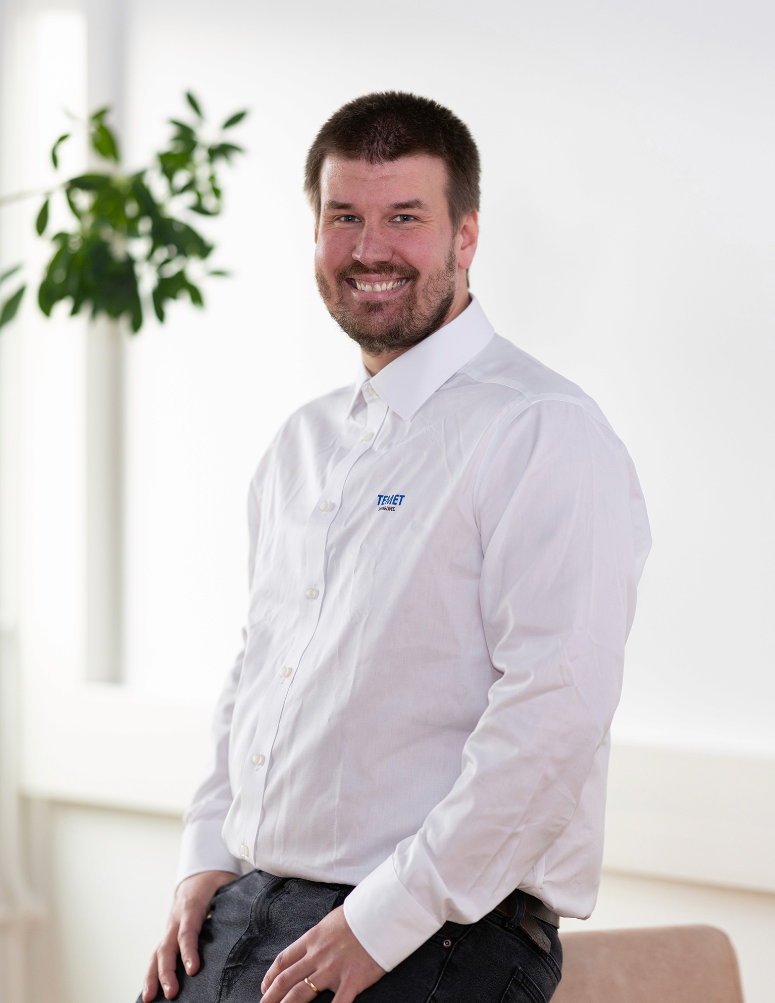 Portrait of John Doe Anderson, CEO of Omnis.