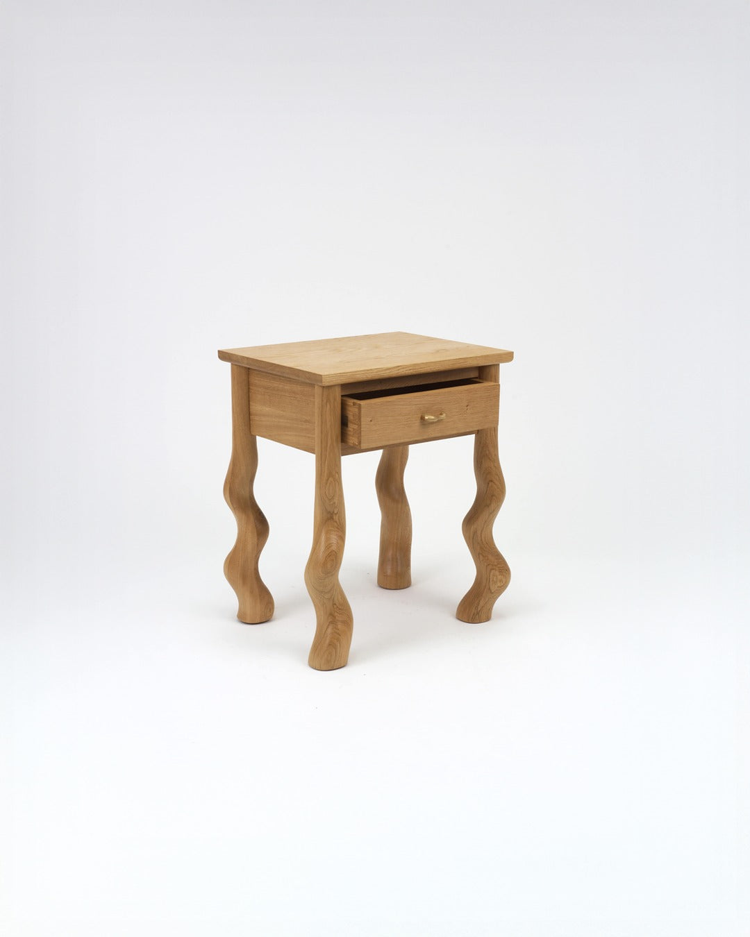 Dancing Bedside Table in Oak angled white background