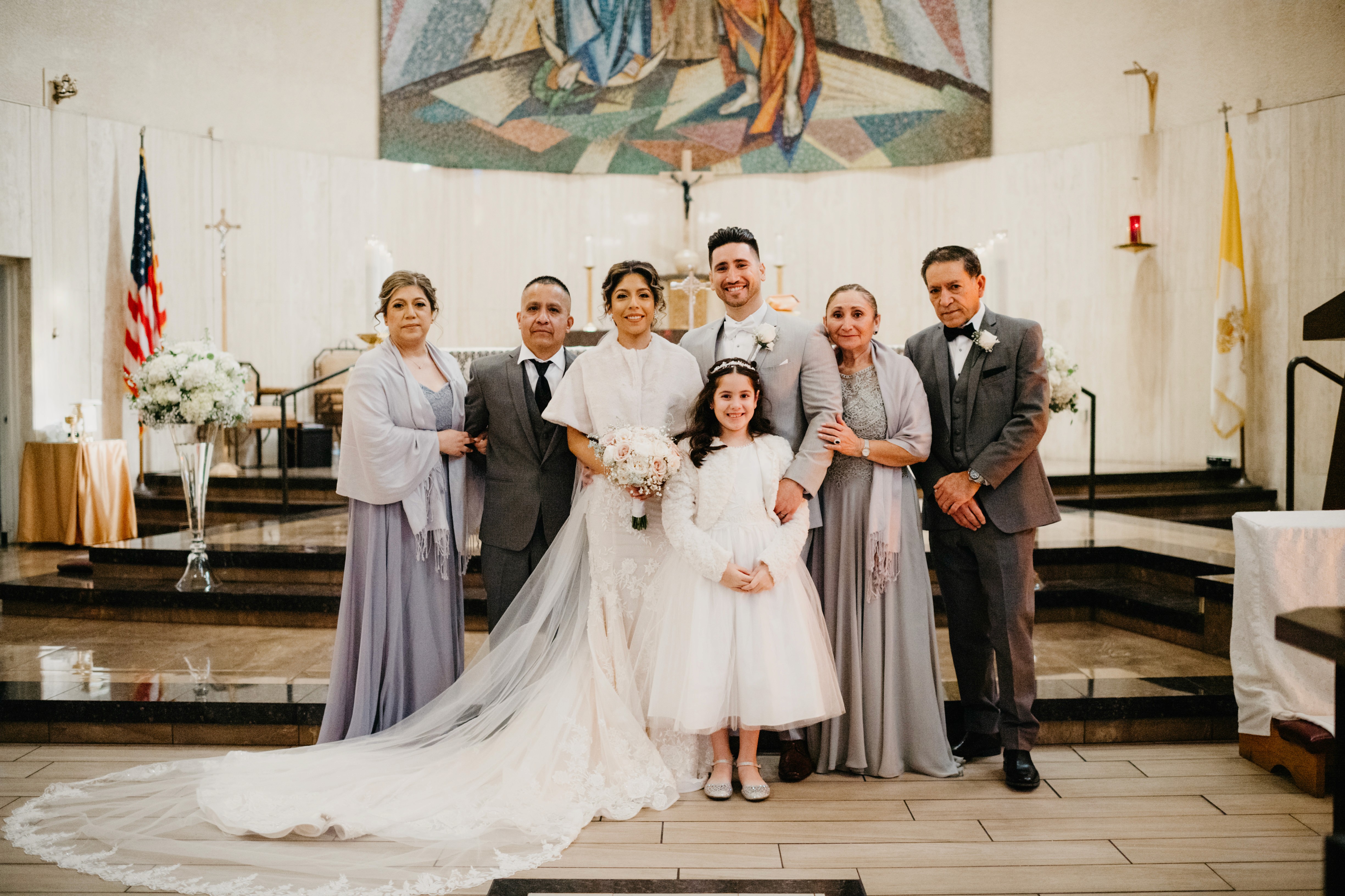 Family photos outside St. Anne’s Catholic Church wedding in Las Vegas