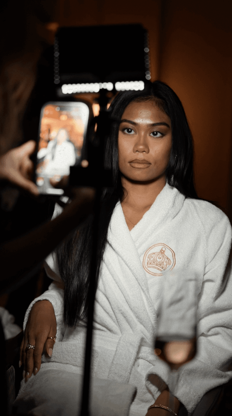 Bride and groom walking on street at night