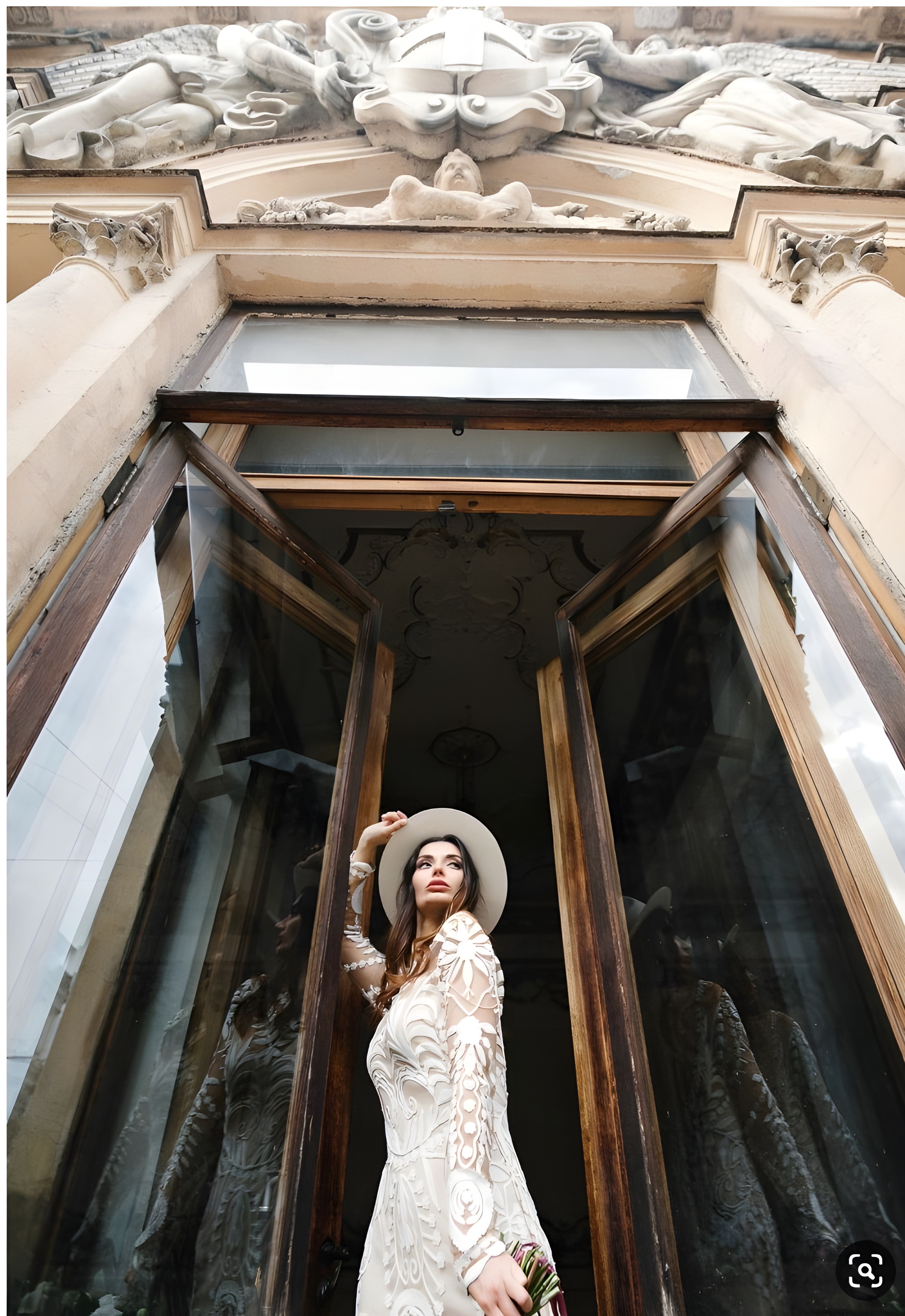 lady grand doorway posing