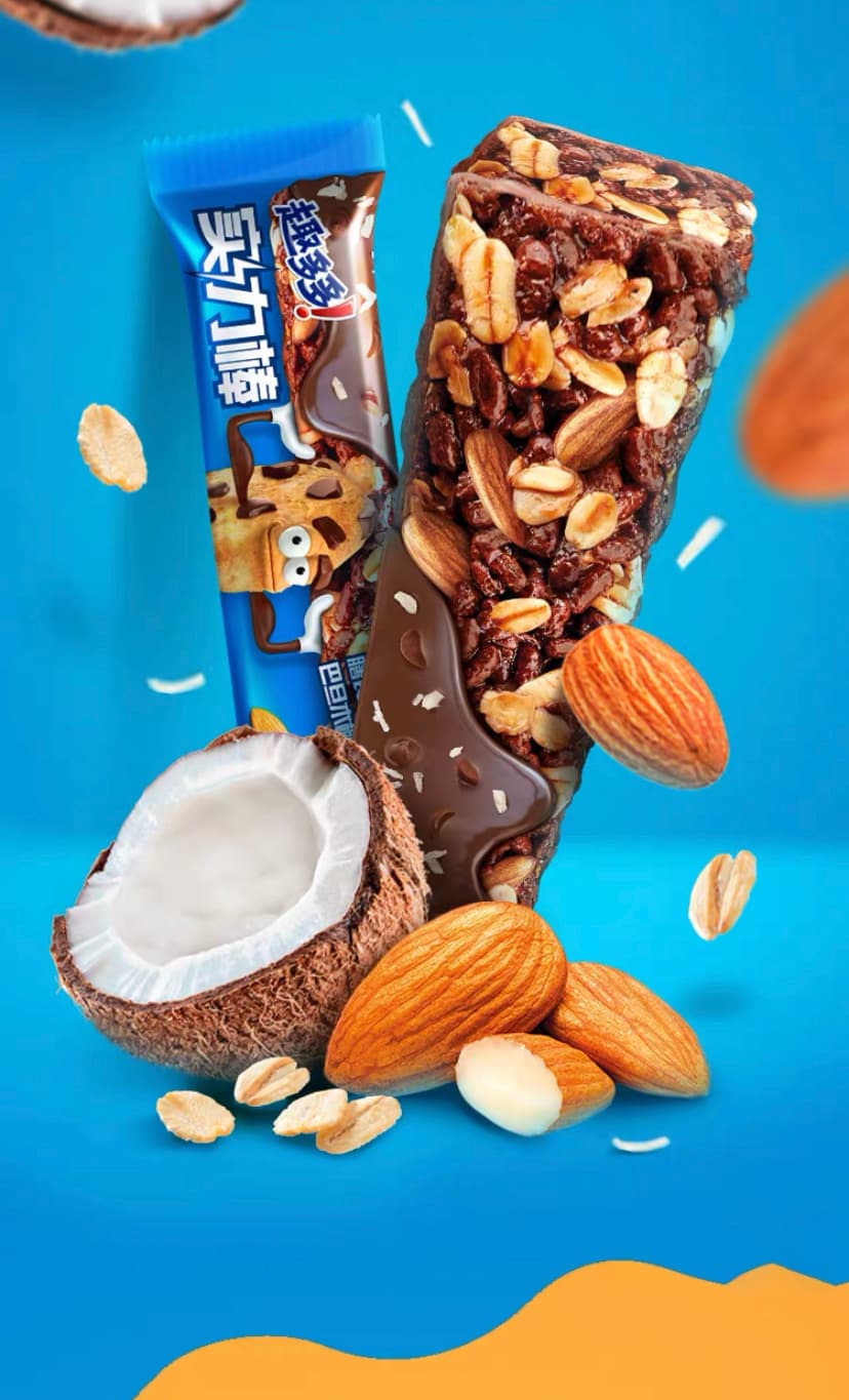 A chocolate bar showing ingredients like coconut, almonds on blue background.
