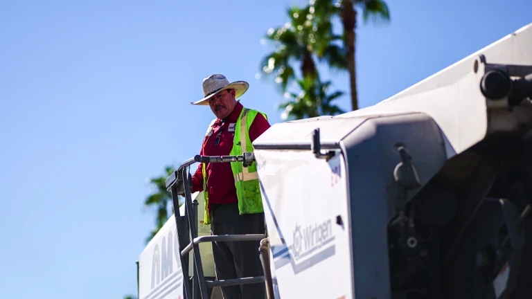 Cold-mill grinder machine operator on a paving project