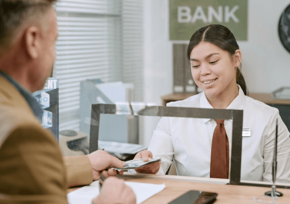 Businessman opening a corporate bank account for JAFZA offshore company registration.