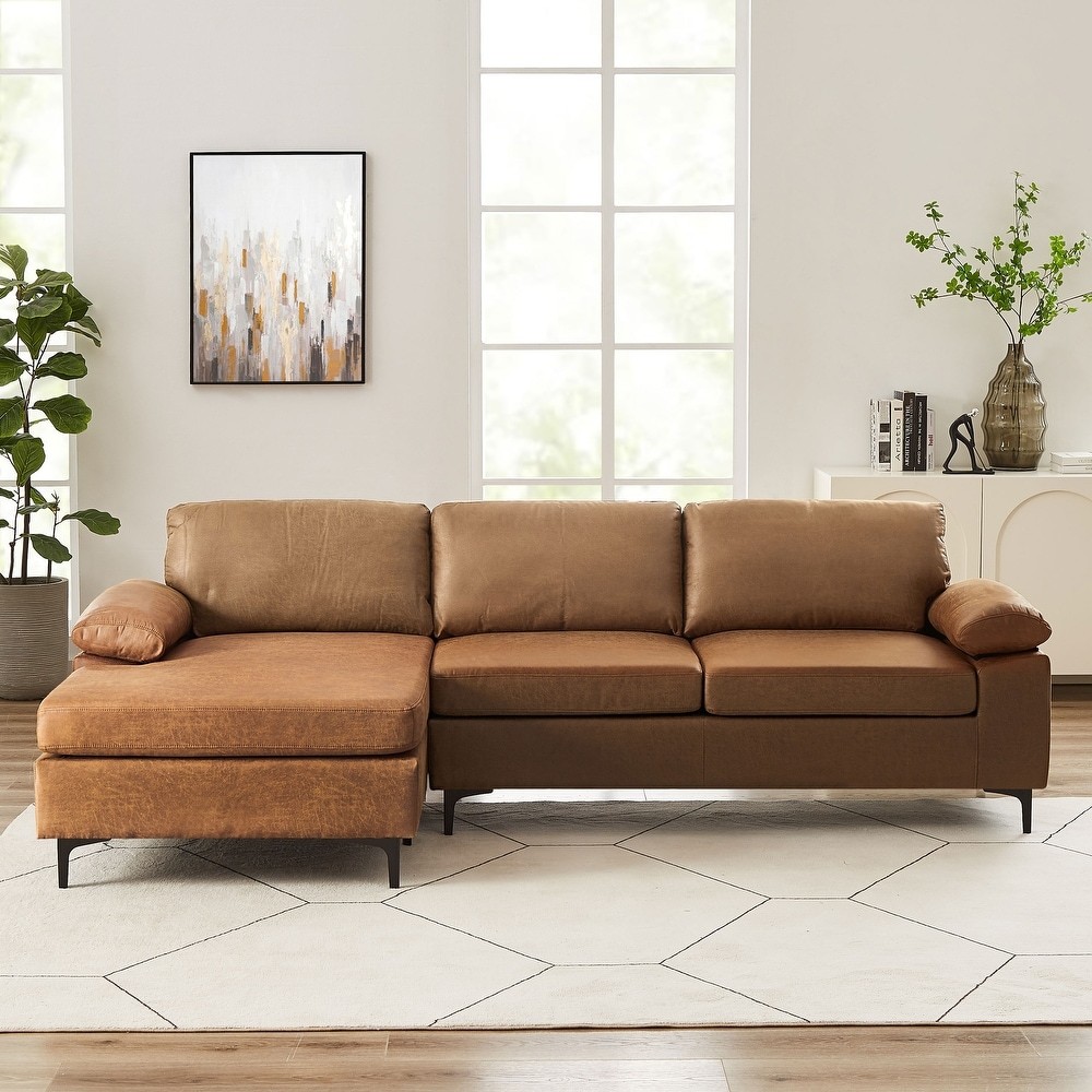 Reversible faux suede sofa with a sleek design, offering a soft and luxurious feel in a spacious 100-inch layout.