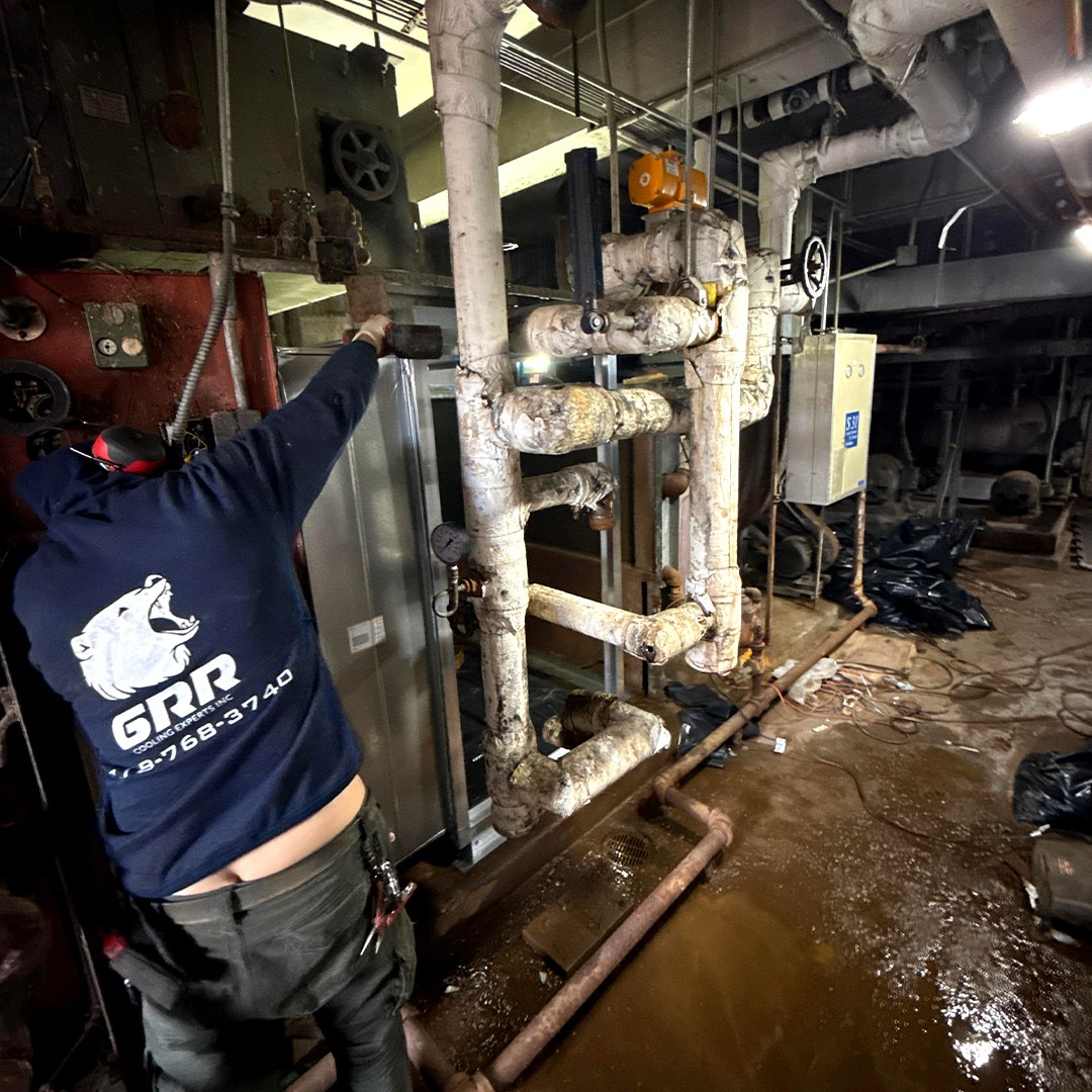 Chilled-water piping and coil section area during HVAC retrofit inside The Brooklyn Hospital Center.