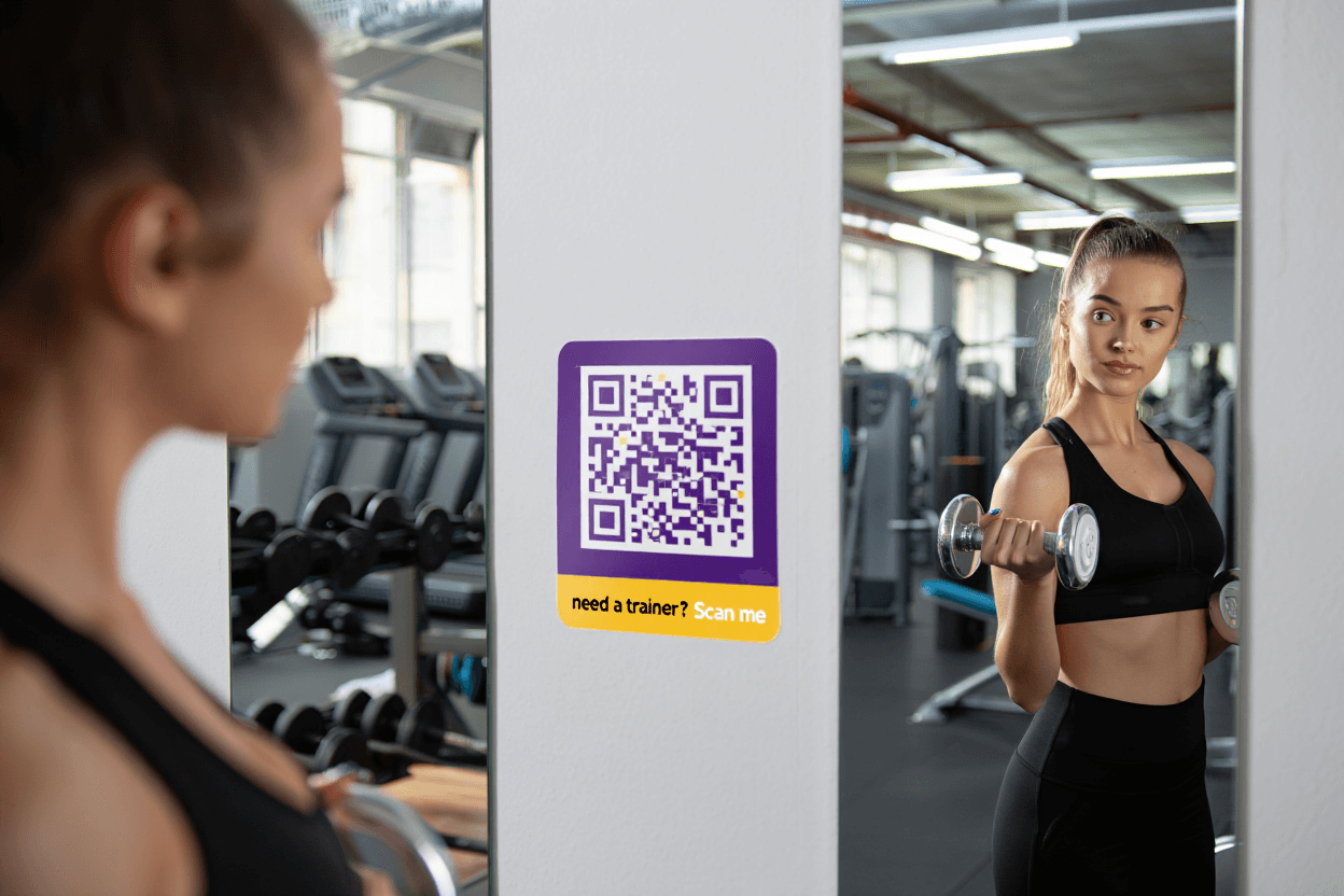 A woman working out at gym. A QR-code for personal training displays in front of her. QR-codes.com