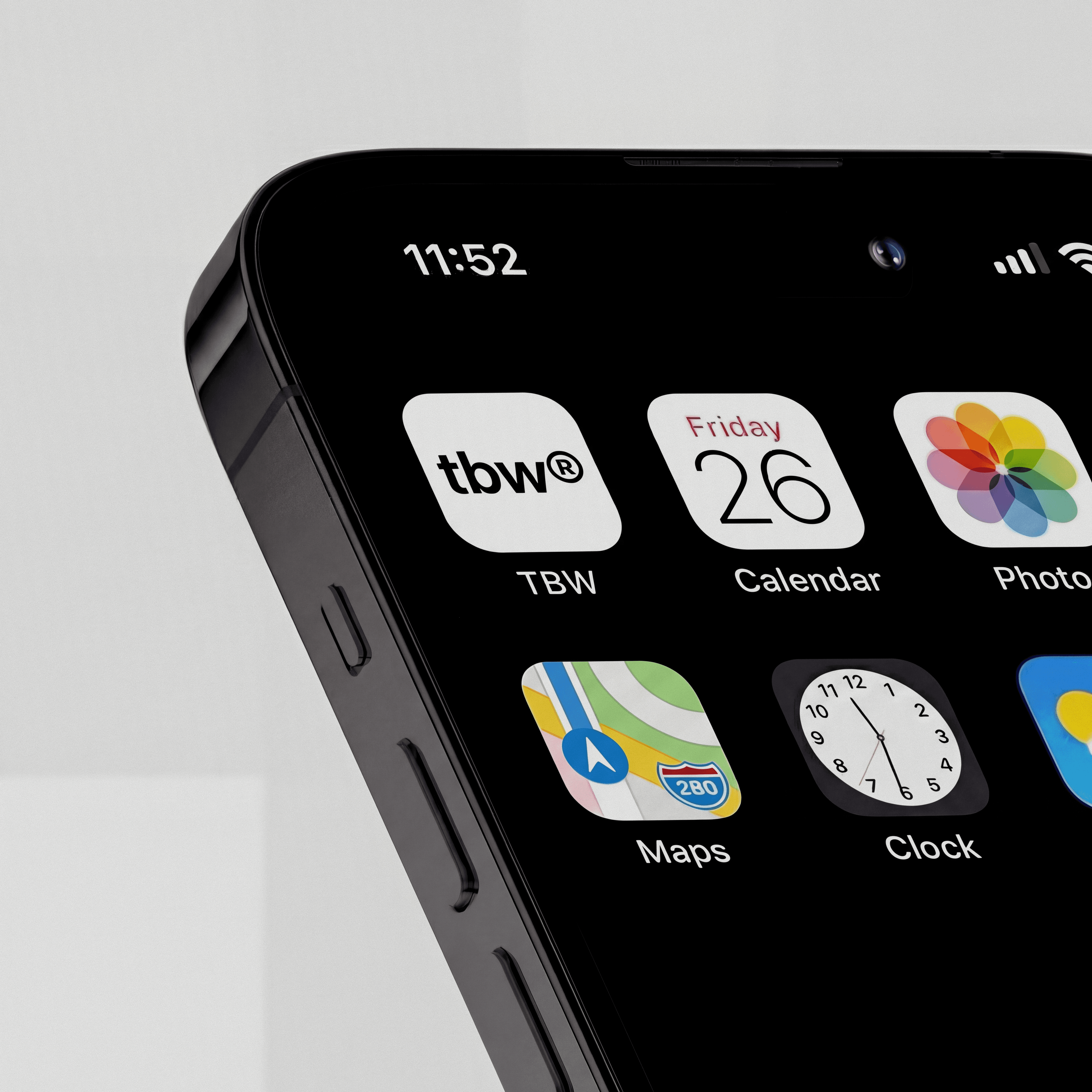 Person in a white off-shoulder top using a MacBook laptop, with text overlay 'What's new in digital?' and the fabrica® logo in the top corner.