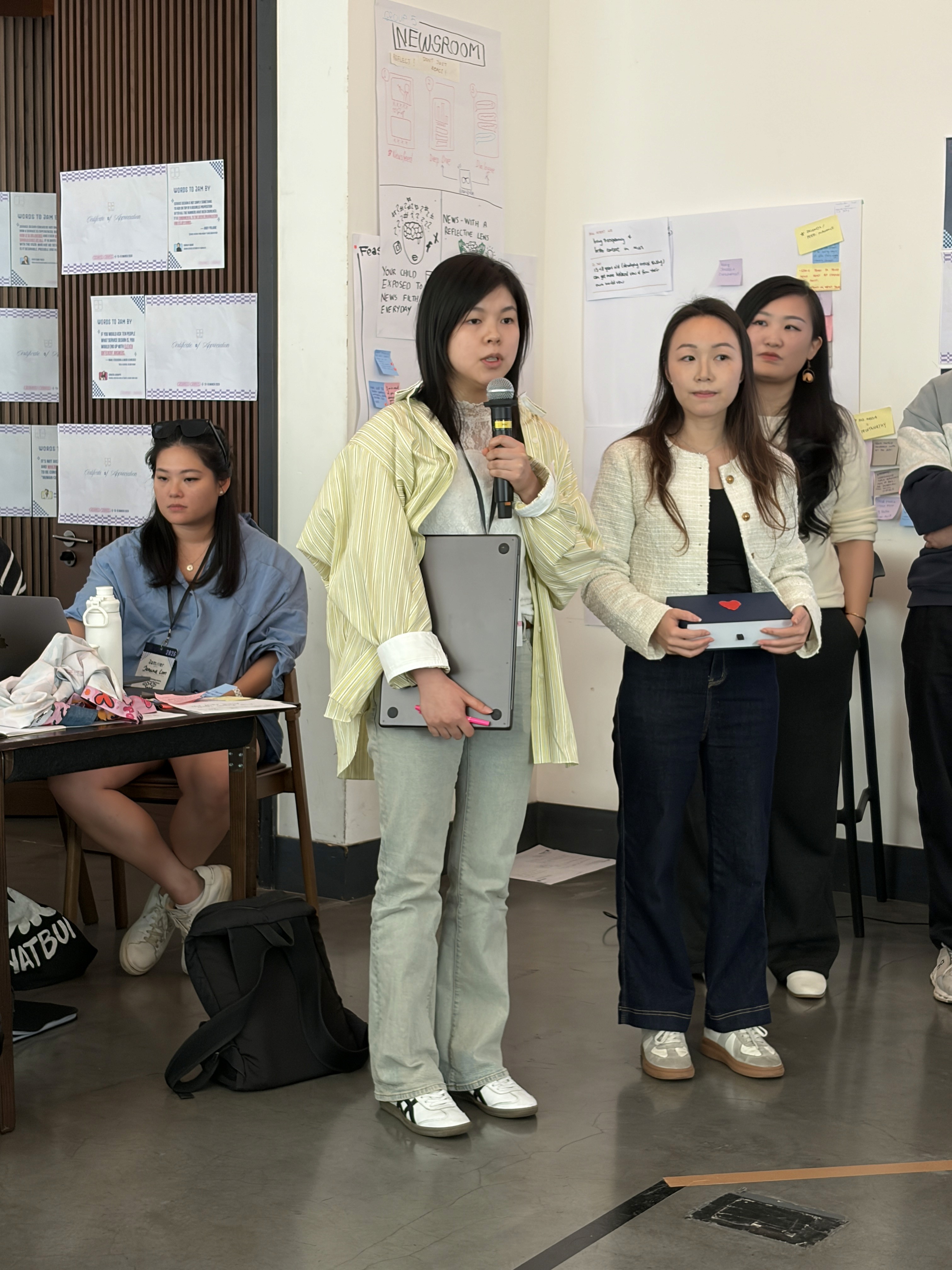 Team members presenting Safe & Sound