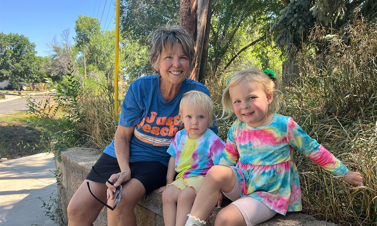 Grandmother with her two granddaughter outdoors in Denver, Colorado
