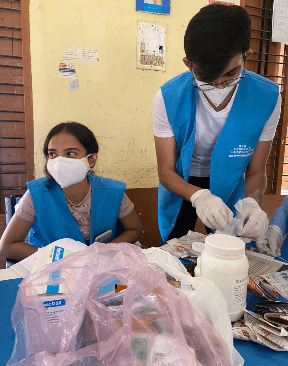 boy holding stock pot