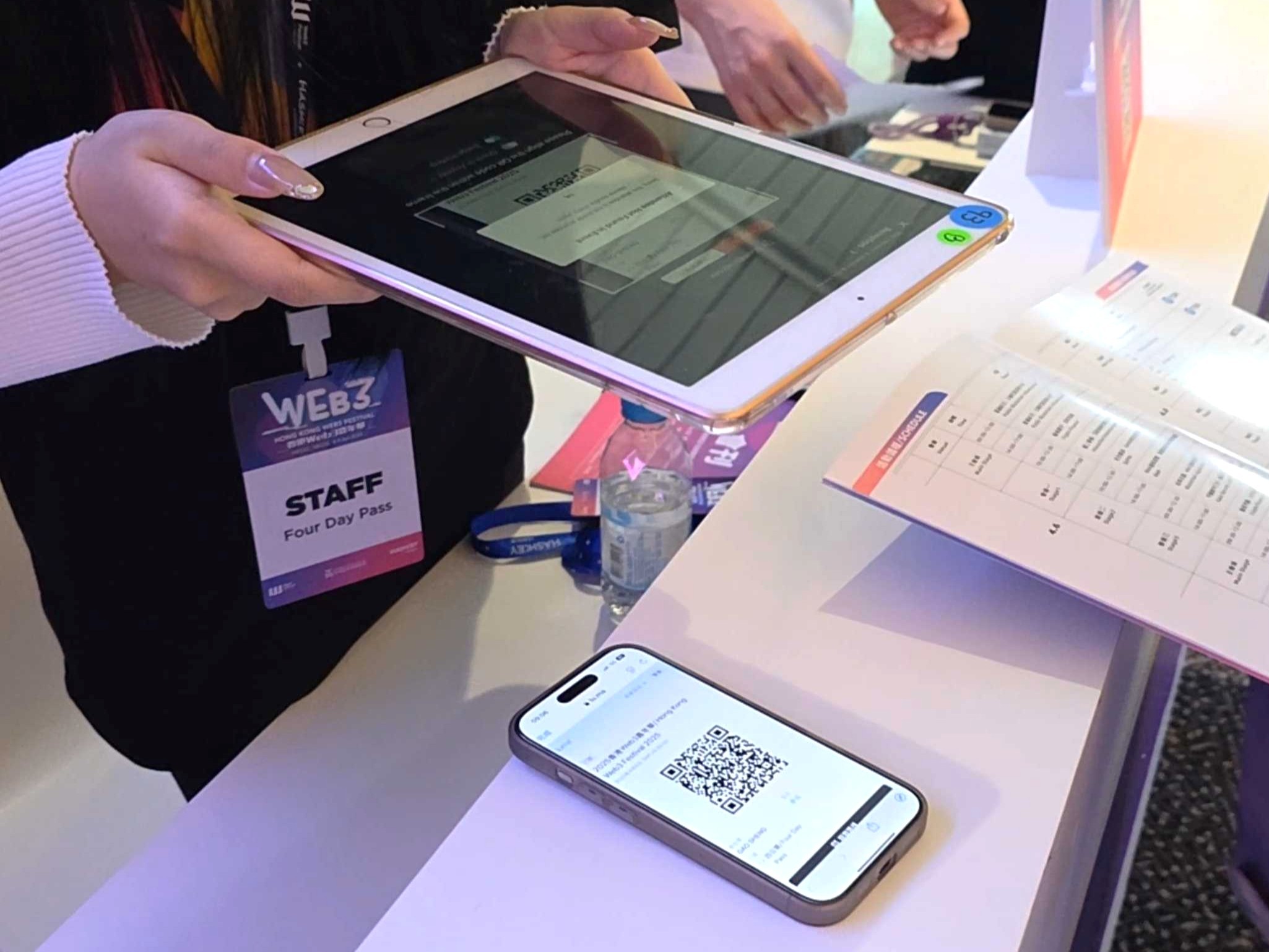 Scanning the QR code for event check-in onsite