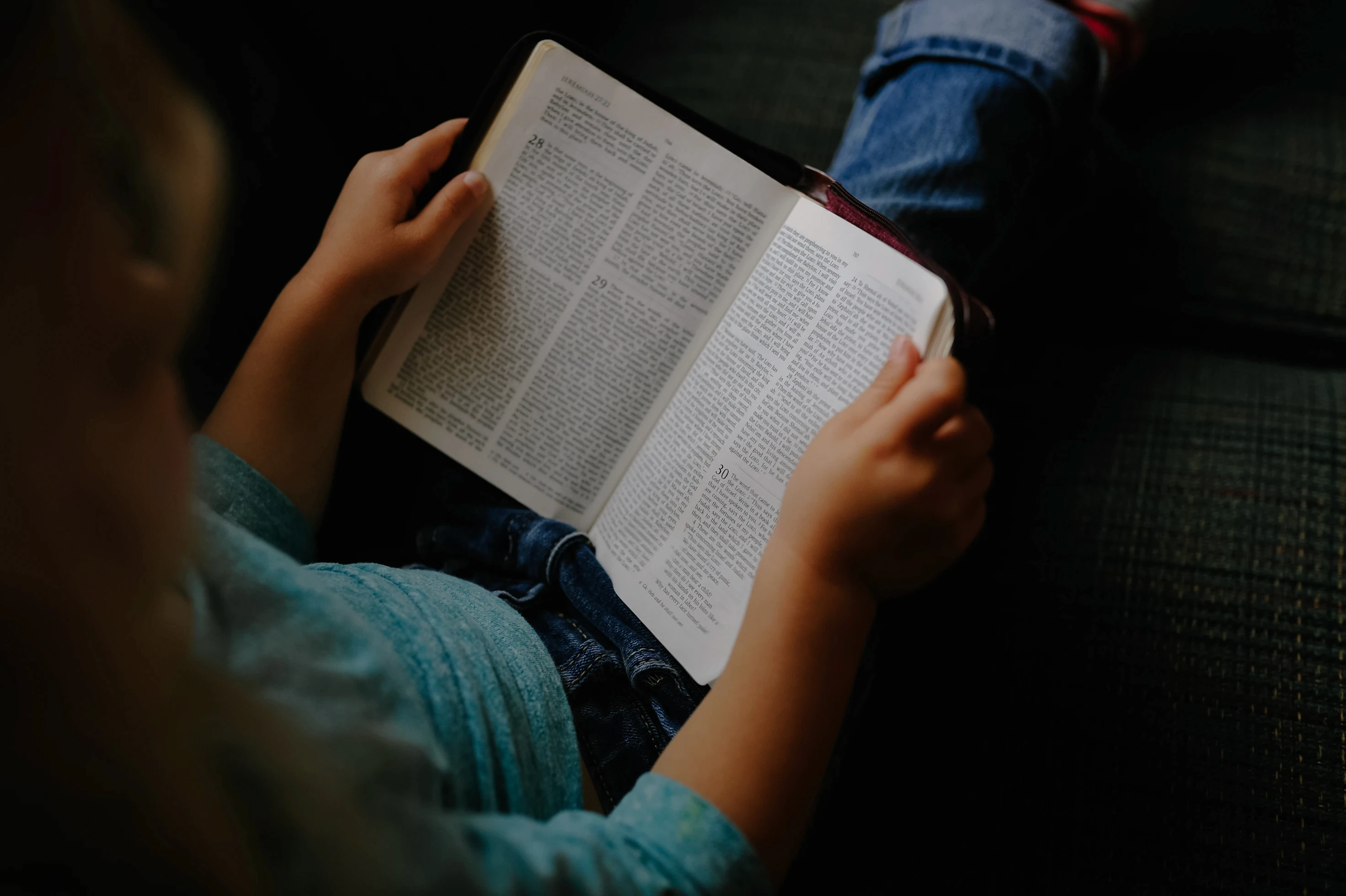 Kid reading bible