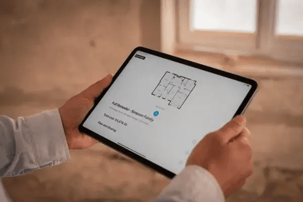 magic plan displaying a digital floor plan on a tablet during an on-site property inspection