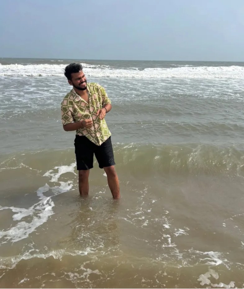 Knee-deep and grinning