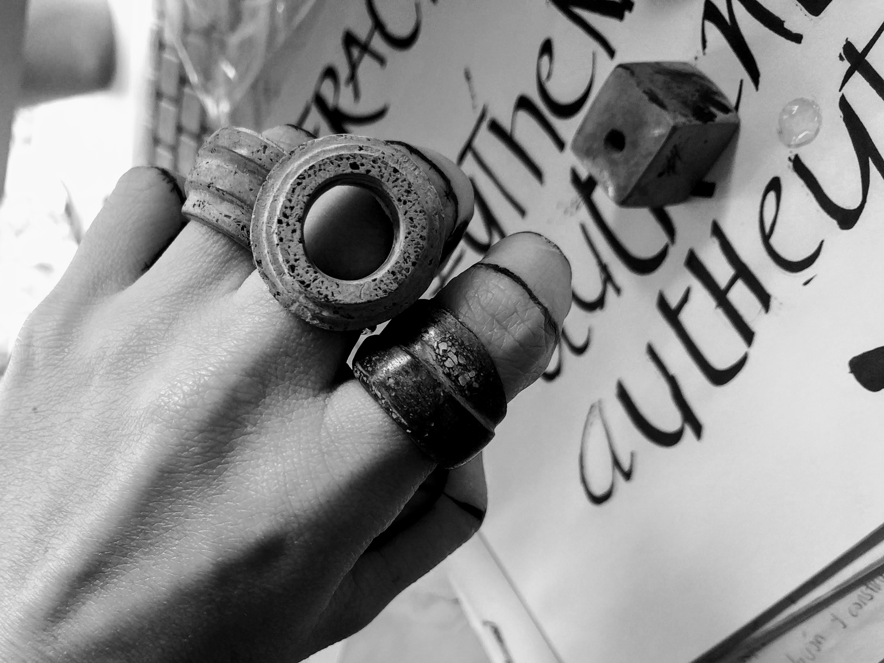 brown wooden lounger near body of water