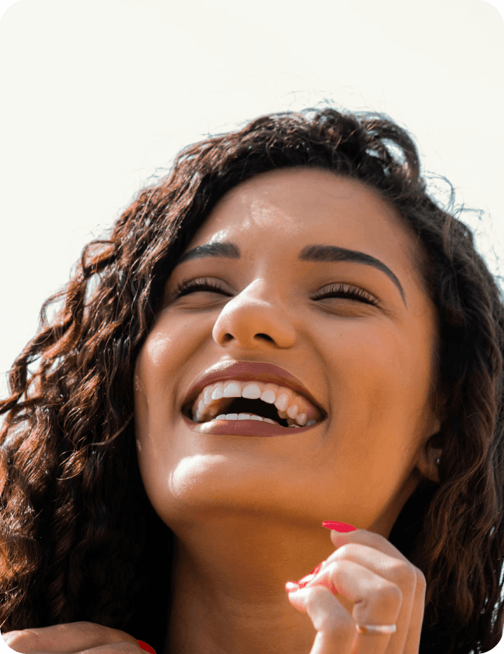 woman with brown hair smiling