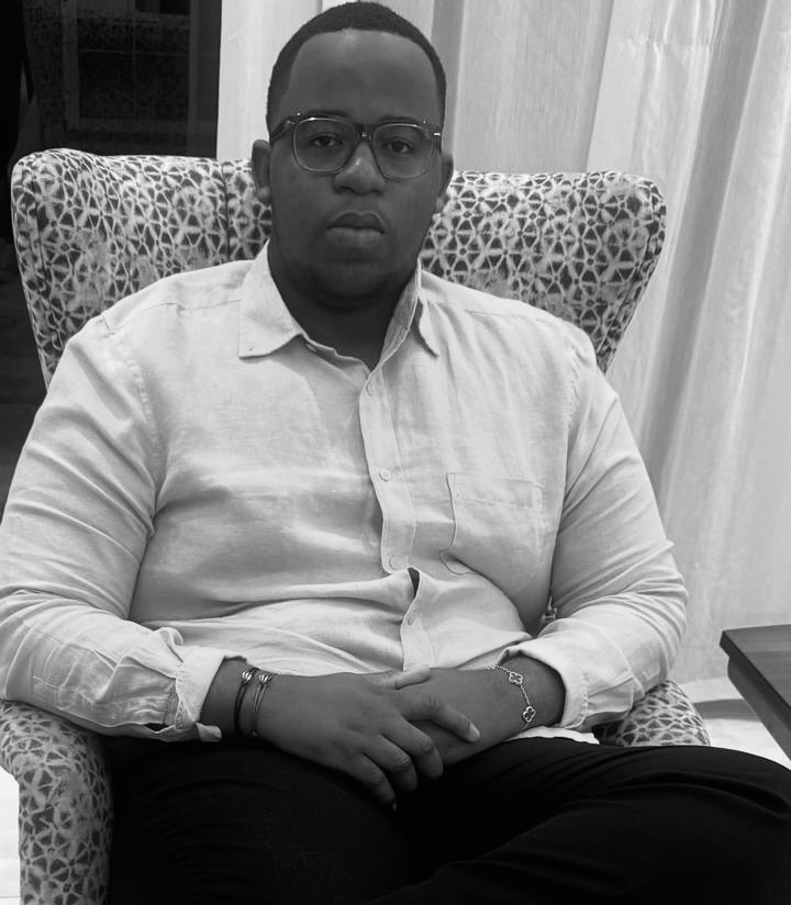 woman in white crew neck shirt smiling