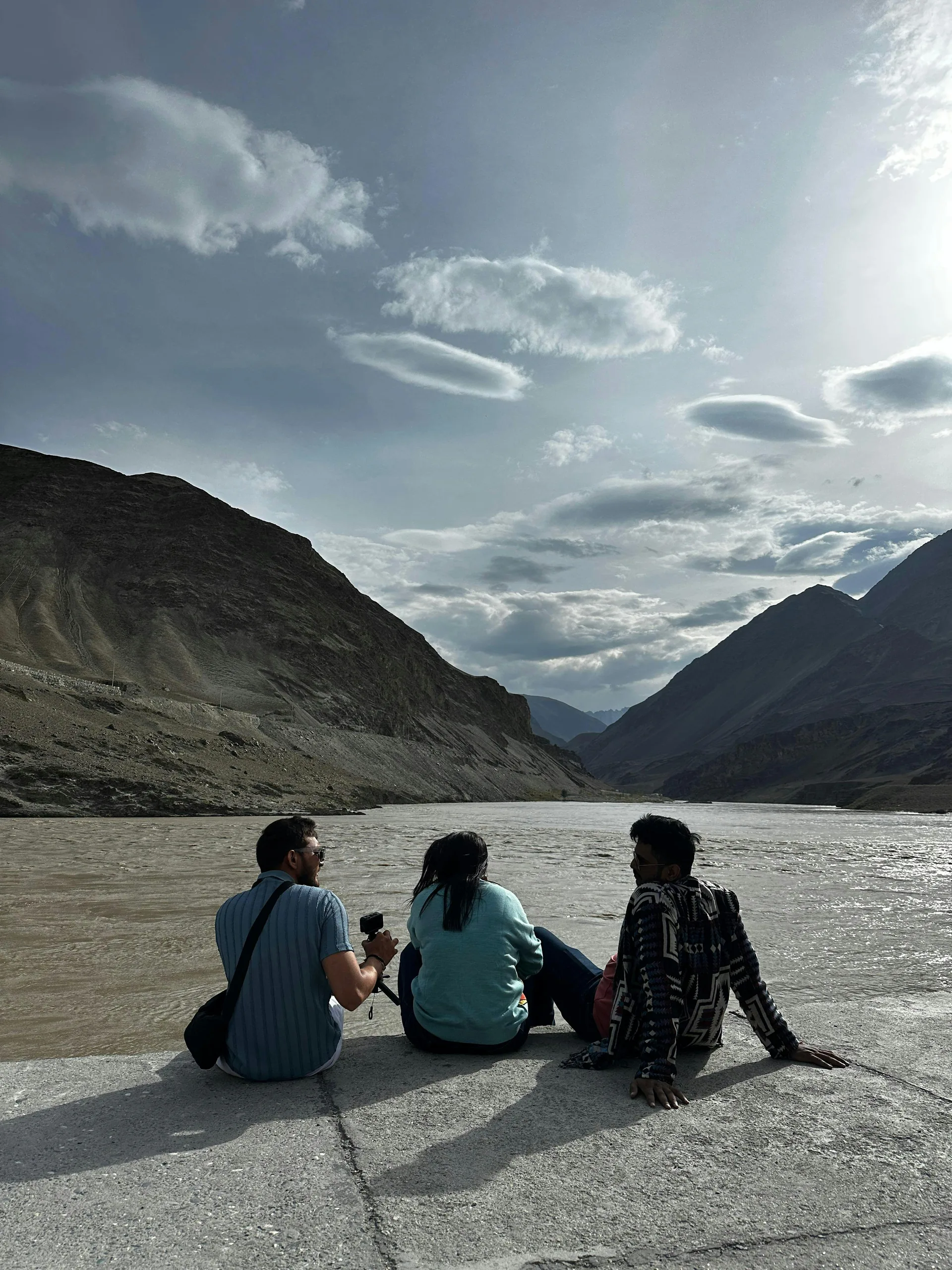 a black and white living room with a large tv