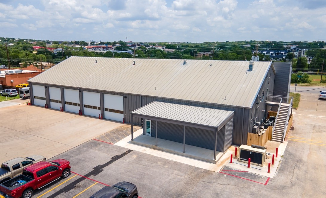 Aerial view of rear apparatus bay and generator area at City of Marble Falls Fire Station 1, by Martinez Architects.