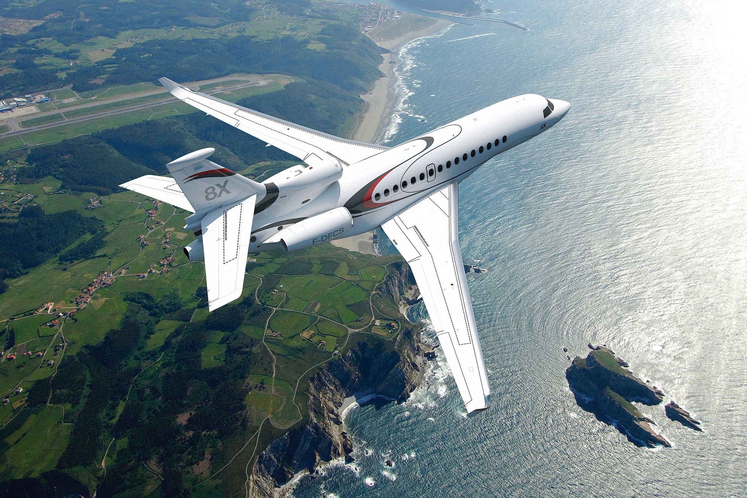 The Falcon 8X is a large, long-range business jet manufactured by Dassault Aviation. Here is a brief description and some specifications for the aircraft:     Crew: 2 pilots  Capacity: Up to 19 passengers  Length: 80 ft 3 in (24.5 m)  Wingspan: 86 ft 3 in (26.3 m)  Height: 26 ft 2 in (7.98 m)  Max take off weight: 73,000 lb (33,112 kg)  Max speed: Mach 0.90 (541 kn; 1,002 km/h)  Range: 6,450 nmi (11,945 km) with 8 passengers and 4 crew  Engines: 3 × Pratt & Whitney Canada PW307D turbofans, 6,722 lbf (29.9 kN) thrust each  Avionics: Dassault EASy III flight deck with four 14-inch LCD screens     The Falcon 8X is an updated version of the Falcon 7X, featuring a longer range, more advanced avionics, and a redesigned cabin.      The aircraft is capable of flying non-stop from New York to Dubai or from Los Angeles to Moscow, and is well-suited for transcontinental and intercontinental travel.      Its spacious cabin offers a range of seating configurations and amenities, including a full galley, a lavatory, and a separate baggage compartment.      The Falcon 8X also features advanced noise reduction technology, making it one of the quietest business jets in its class.