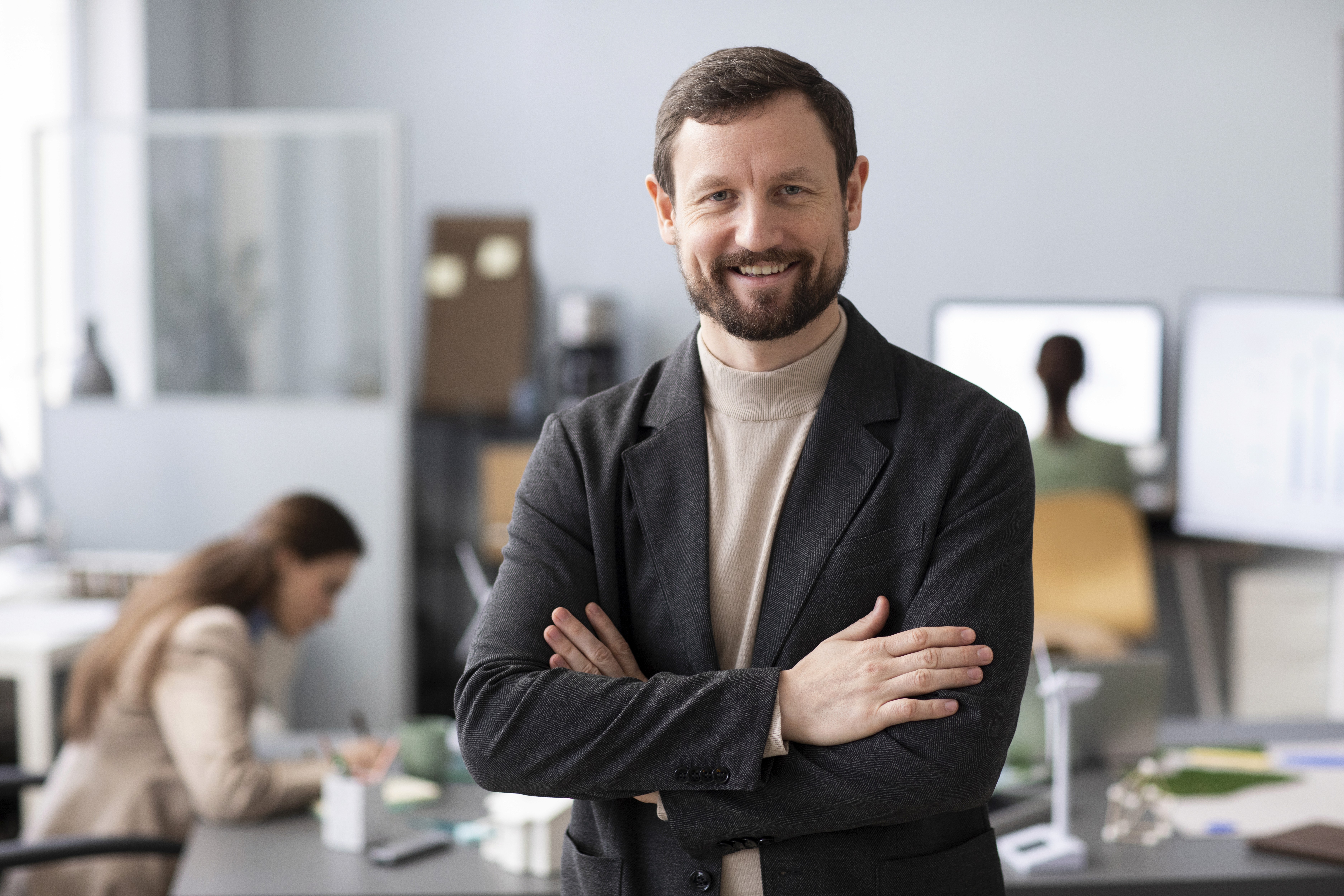 man in white dress shirt sitting beside woman in black long sleeve shirt