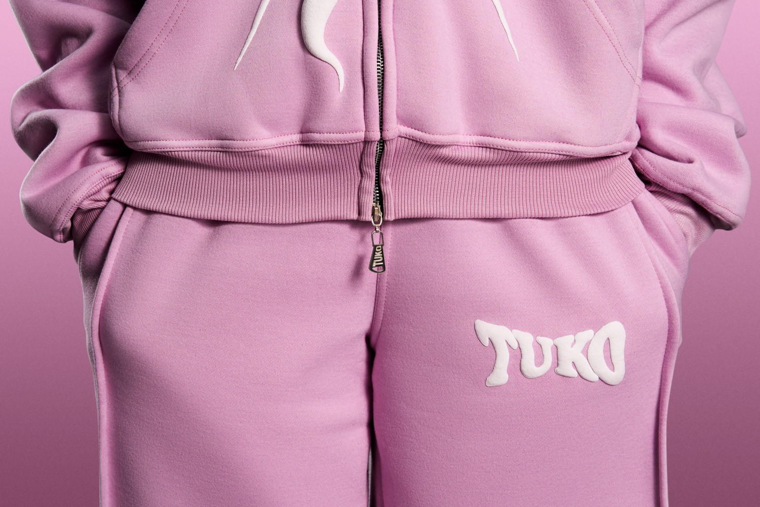 Tuko Clothing pink Dandadan inspired tracksuit detail shot photographer by Matthew Brown (London product photographer).