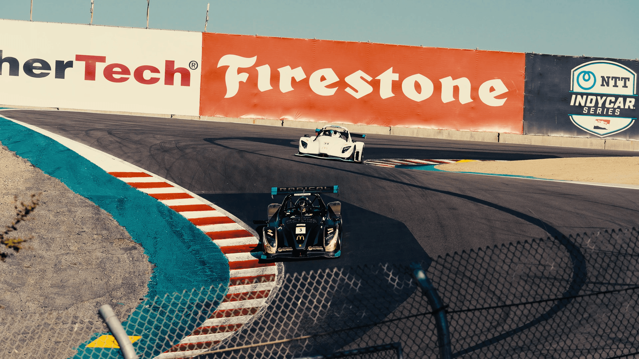 Suellio Almeida. IMSA Driver, North America Radical Racecar Champion, Founder of Almeida Racing Academy. Driving SR3 at Laguna Seca Corkscrew during 2024 Radical NA Championship