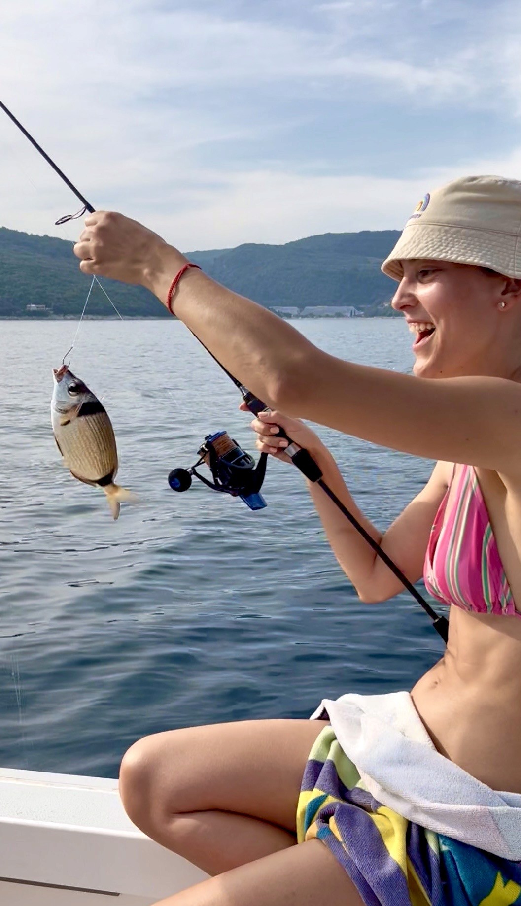 Levante fish and bait tour girl fishing