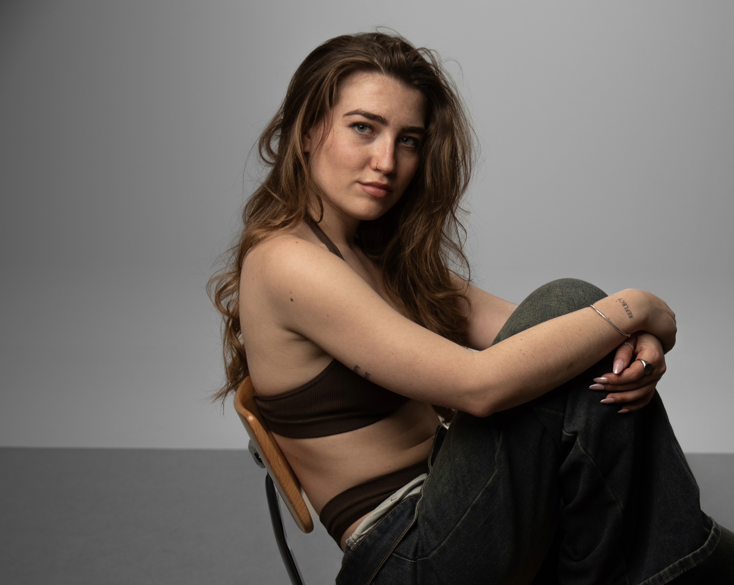 Elegant portrait photographed in soft studio light
