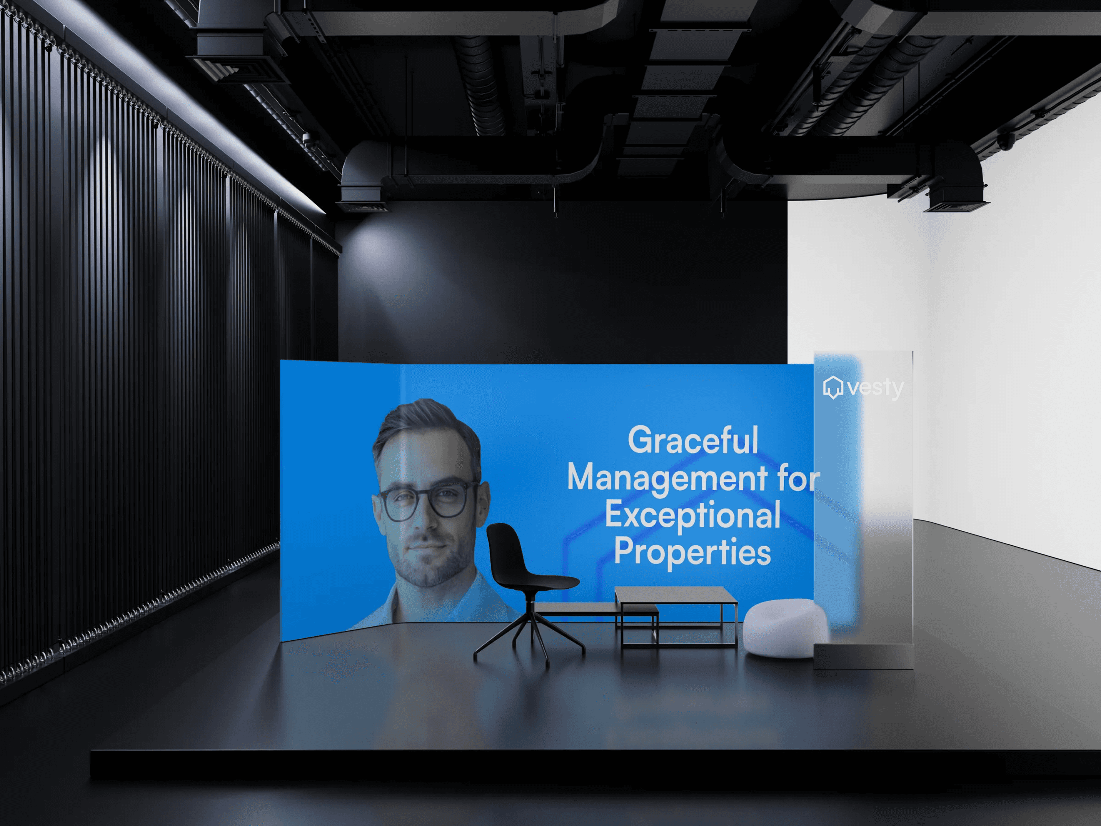 Modern dark exhibition space with a curved screen showing a suited man and the 'vesty' logo